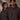 Two people wearing Coco brown hoodies with 'LUXE' branding against a neutral background